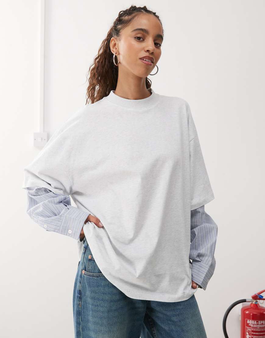 Lioness - Langärmliges T-Shirt im 2-in-1-Design mit T-Shirt-Overlay in Grau und Blau gestreift mit Oversized-Passform Lioness - Langärmliges T-Shirt im 2-in-1-Design mit T-Shirt-Overlay in Grau und Blau gestreift mit Oversized-Passform von Lioness