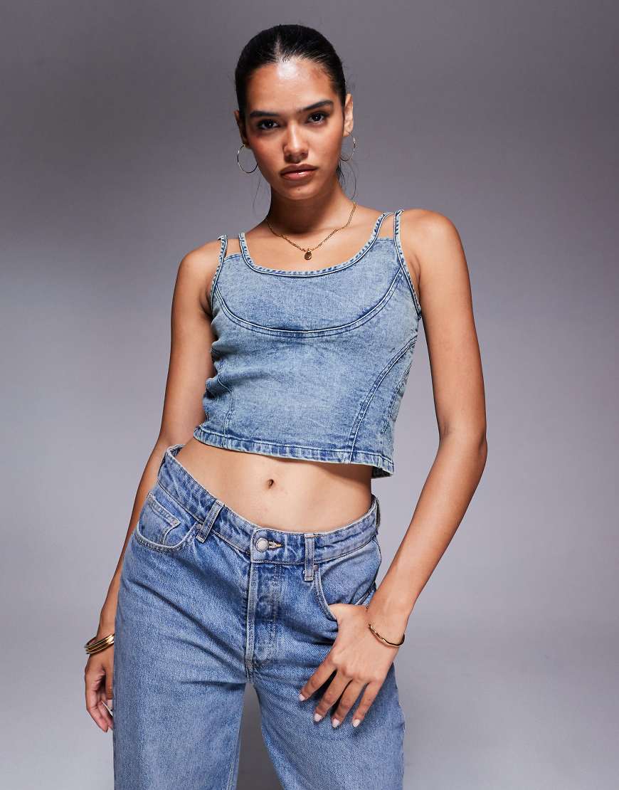 Liquor N Poker - Cropped-Jeansoberteil in blauer Vintage-Waschung mit Ziernaht Liquor N Poker - Cropped-Jeansoberteil in blauer Vintage-Waschung mit Ziernaht von Liquor N Poker