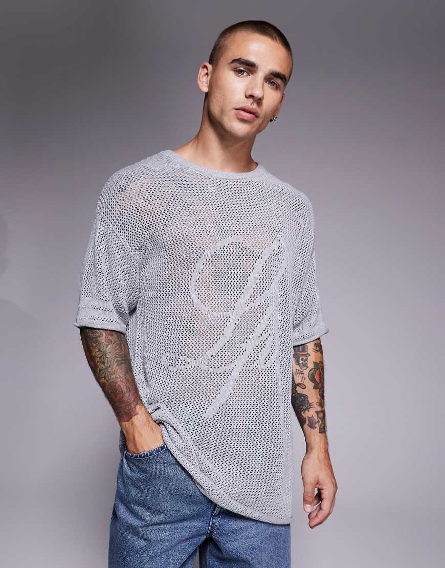 Liquor N Poker - Oberteil in Grau aus Strickjersey mit „Rebel 13"-Logo Liquor N Poker - Oberteil in Grau aus Strickjersey mit „Rebel 13"-Logo von Liquor N Poker