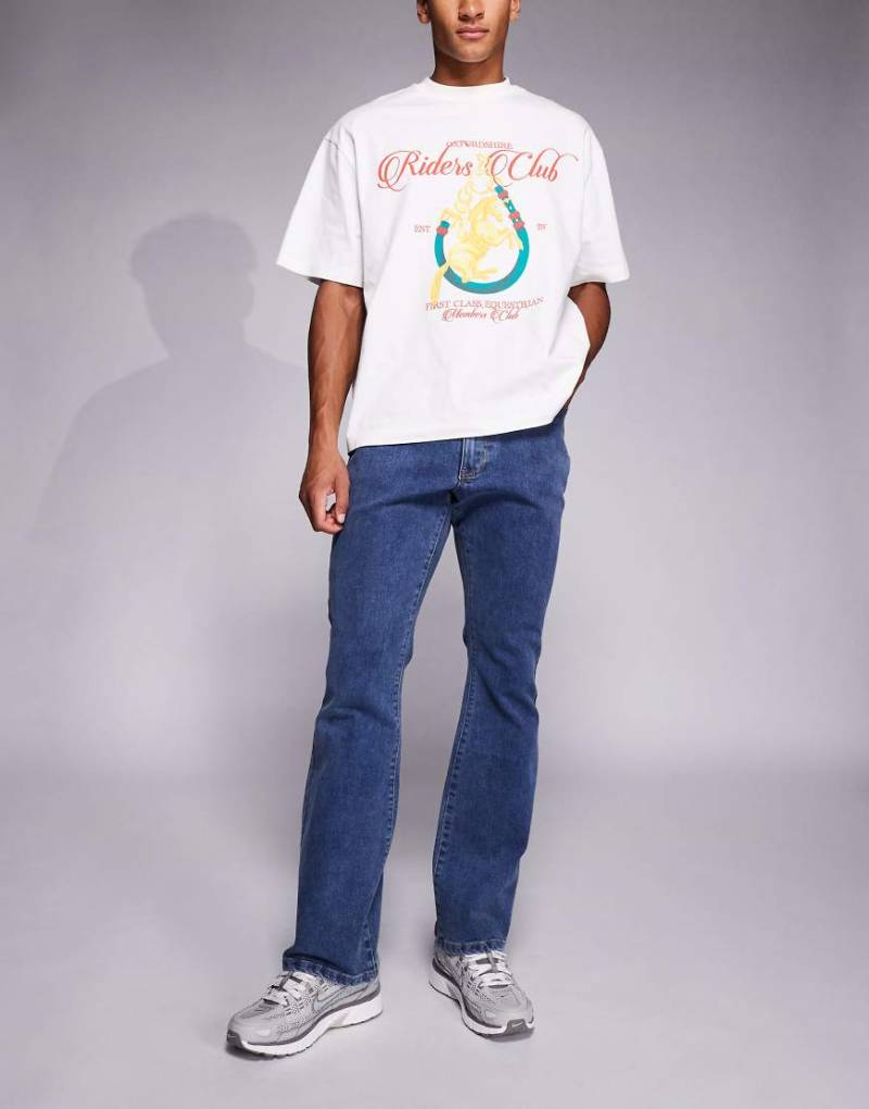 Liquor N Poker - Stacked Slim Fit Schlagjeans in verwaschenem Dunkelblau Liquor N Poker - Stacked Slim Fit Schlagjeans in verwaschenem Dunkelblau von Liquor N Poker