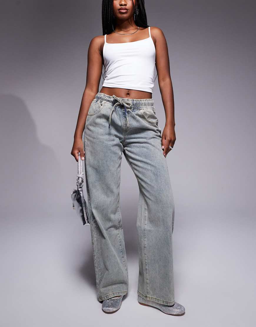 Liquor N Poker - Weite Jeans in Blau mit seitlichem Strassbesatz Liquor N Poker - Weite Jeans in Blau mit seitlichem Strassbesatz von Liquor N Poker