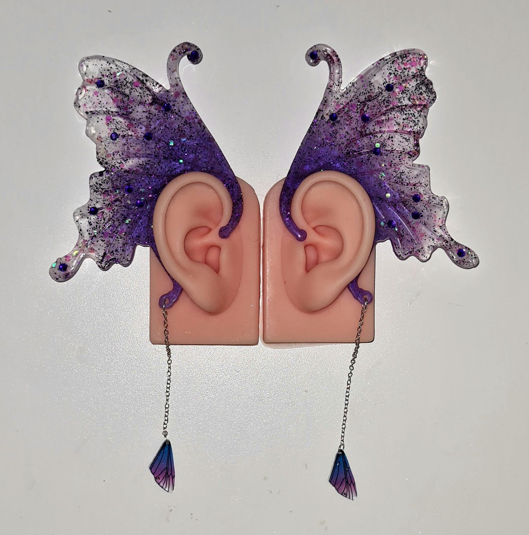 1 Paar Schmetterlings Feen Ohren Manschetten Aus Resin "Azura" Mit Glitzer Elementen Und Kleinen Flügeln, Handgefertigt 1 Paar Schmetterlings Feen Ohren Manschetten Aus Resin "Azura" Mit Glitzer Elementen Und Kleinen Flügeln, Handgefertigt von LissysFantasy