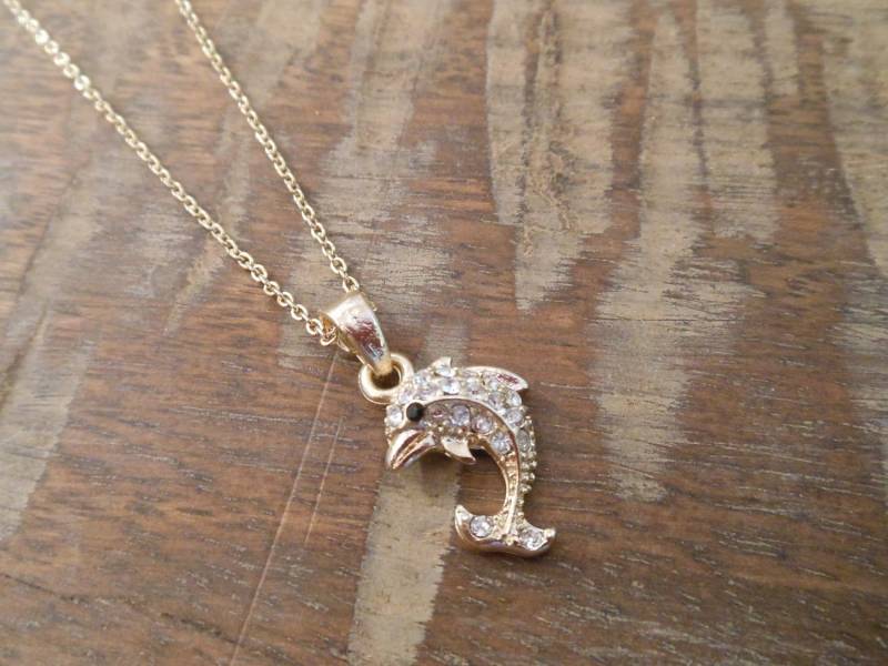 Gold Delphin Halskette - Strass Gold Delphin Halskette - Strass von LiveCoastal