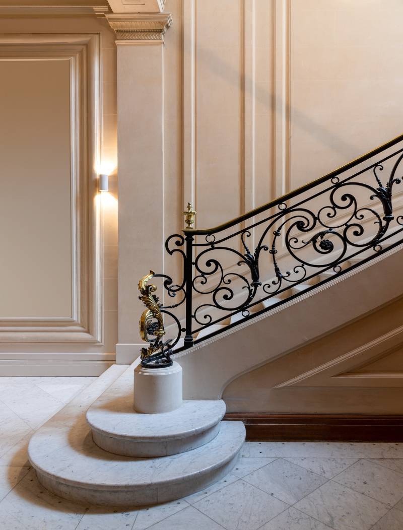 living walls Vliestapete "Fototapete Treppenhaus Geländer Beige Schwarz" matt strukturiert von Living Walls