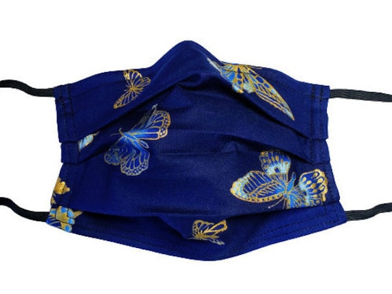 Metallic Blue Schmetterlinge Wiederverwendbare Verstellbare Gesichtsmaske Mit Filterfach Und Nasenklemmendraht Metallic Blue Schmetterlinge Wiederverwendbare Verstellbare Gesichtsmaske Mit Filterfach Und Nasenklemmendraht von LochNessLocker