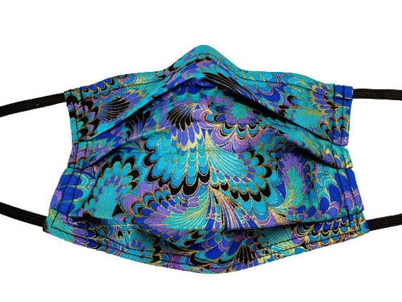 Metallic Federn Wiederverwendbare Verstellbare Gesichtsmaske Mit Nase Pinch Wire Und Filter Tasche Metallic Federn Wiederverwendbare Verstellbare Gesichtsmaske Mit Nase Pinch Wire Und Filter Tasche von LochNessLocker