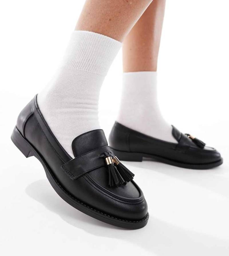 London Rebel Wide Fit - Amelia - Penny-Loafer in Schwarz mit Quaste von London Rebel Wide Fit