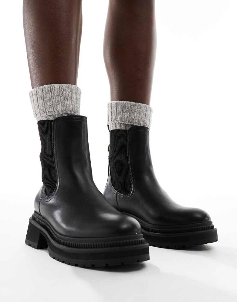 London Rebel - Becky - Klobige Chelsea-Stiefel in Schwarz mit mittelhohem Schaft von London Rebel