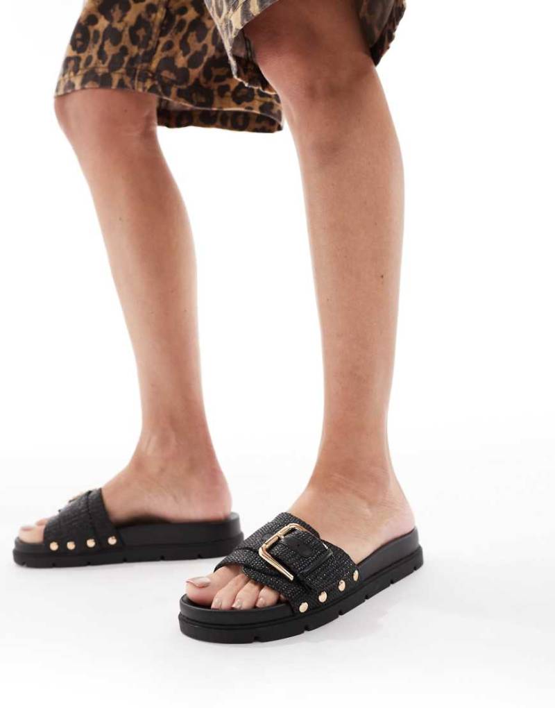 London Rebel - Sandalen in Schwarz aus Bast mit Schnallen- und Nietendetails von London Rebel