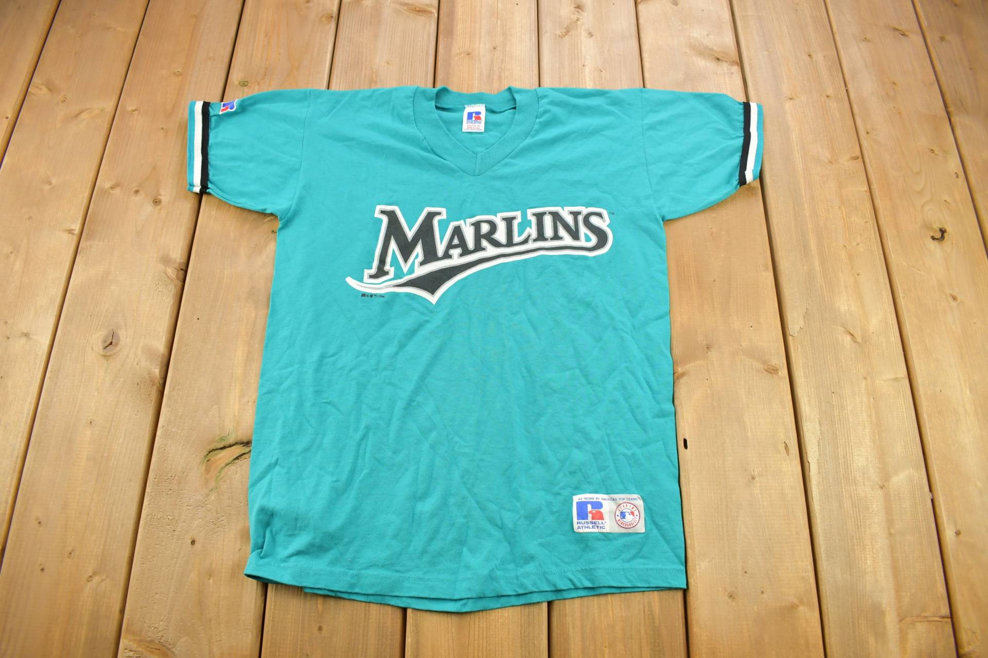 Vintage 1990S Florida Marlins Mlb Russell Athletics Jugend Größe T-Shirt/Made in Usa Single Stitch Lou Gehrig Baseball Shirt von Lostboysvintage