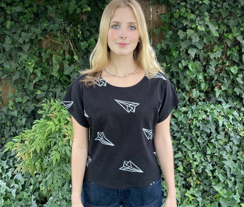 Papierflieger Druck Leinen T-Schwarz von LoveToLoveYou