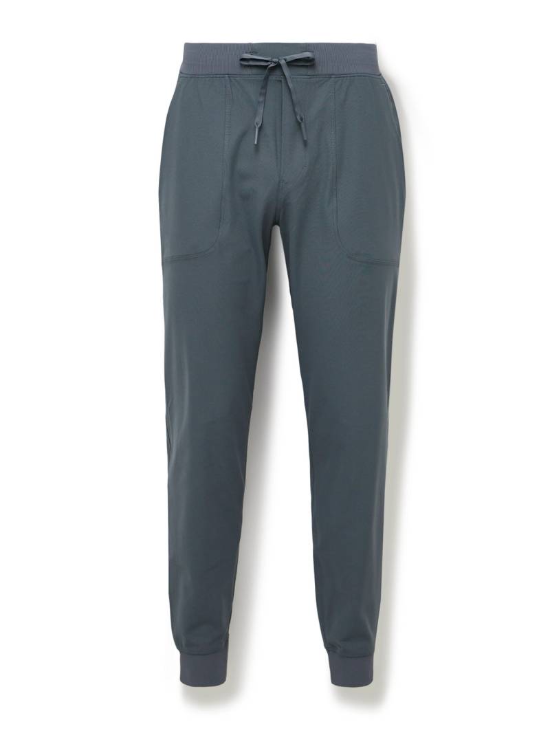 Lululemon - ABC Tapered Recycled-Warpstreme™ Drawstring Trousers - Men - Blue - S von Lululemon