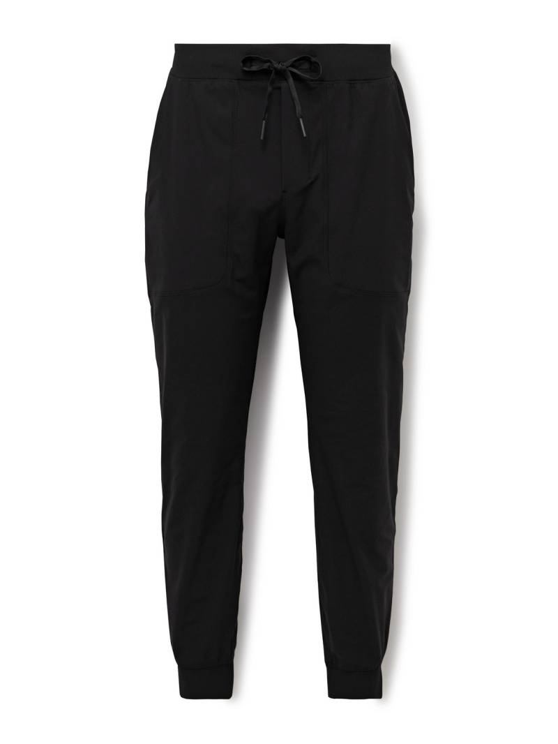 Lululemon - ABC Tapered Warpstreme™ Drawstring Trousers - Men - Black - XL von Lululemon