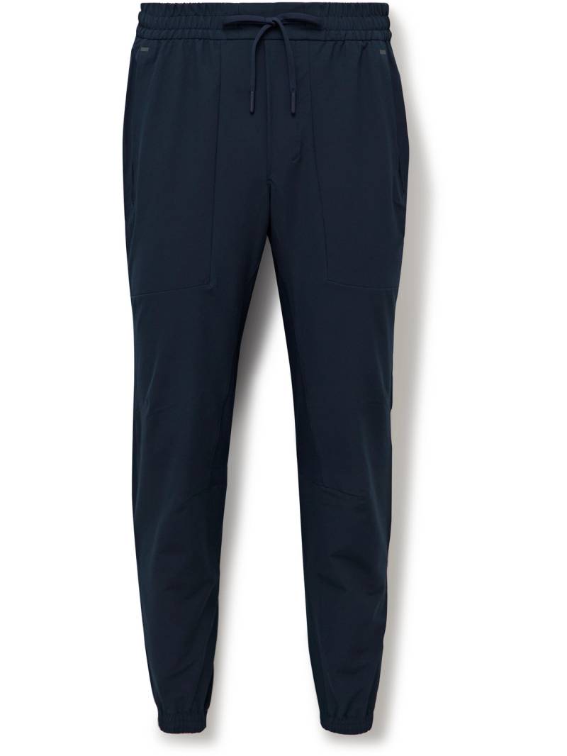 Lululemon - License to Train Slim-Fit Tapered Stretch Recycled-Shell Track Pants - Men - Blue - XXL von Lululemon