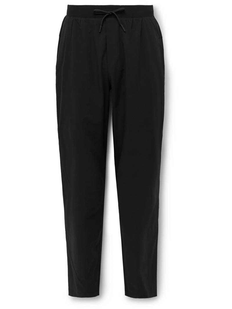 Lululemon - T.H.E. Tapered Stretch Recycled-Shell Drawstring Trousers - Men - Black - XL von Lululemon