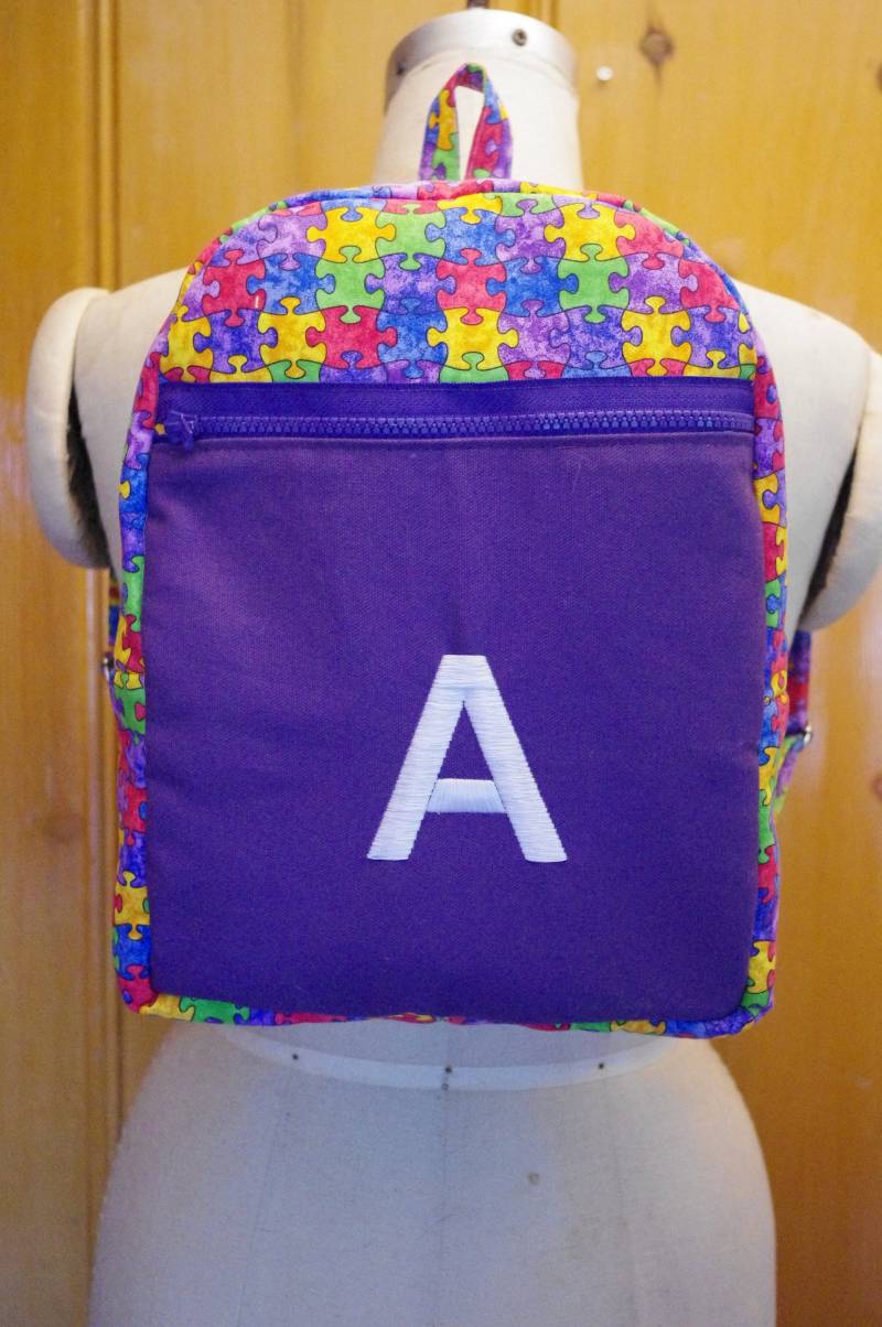 Monogrammiert Puzzleteil Rucksack Monogrammiert Puzzleteil Rucksack von LyraBugDesigns