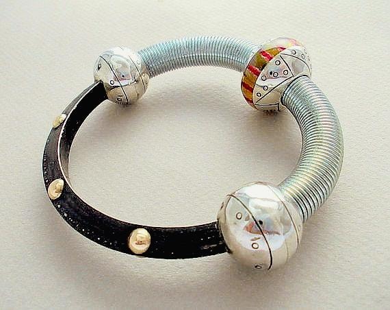 Saturn Armband von MOSHIKOART