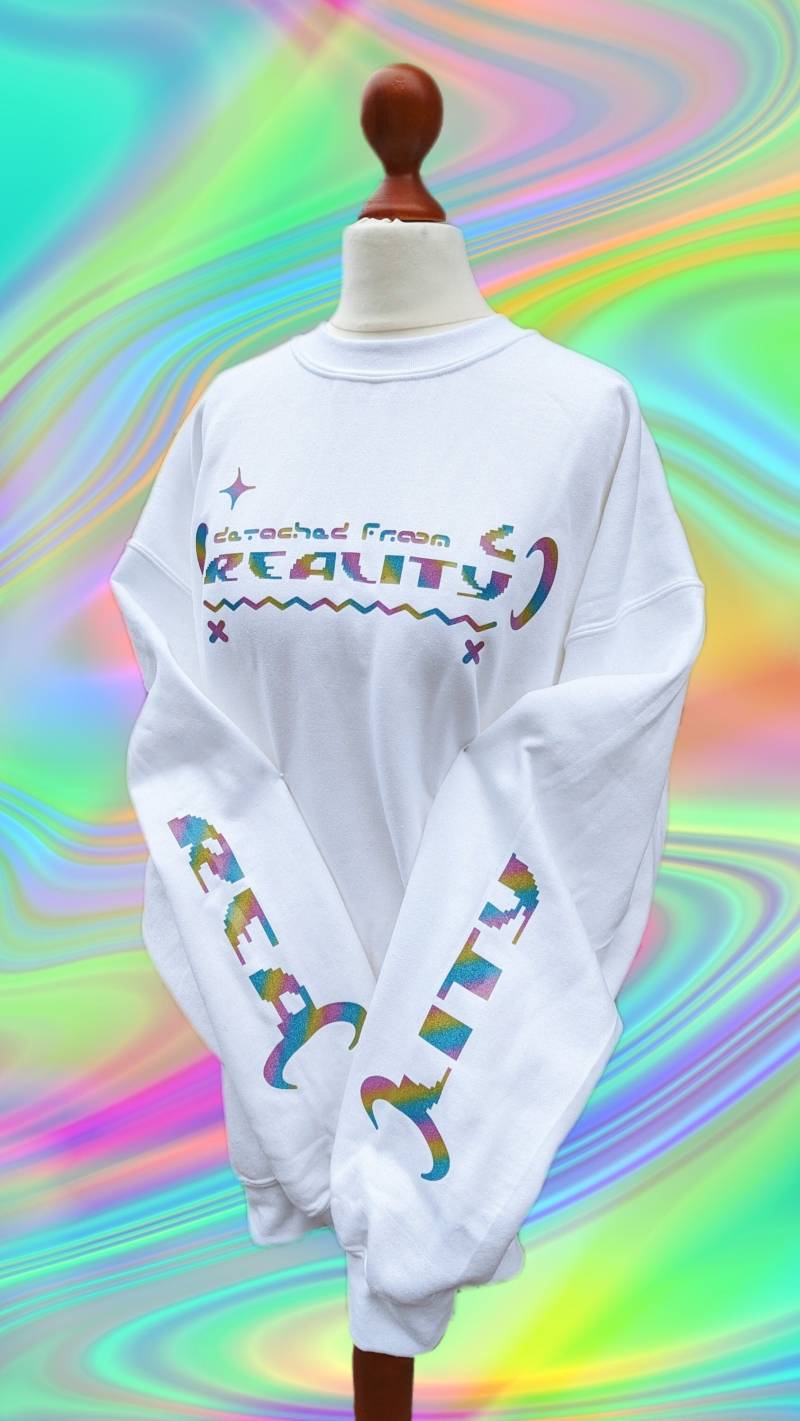 Losgelöst Vom Realitätsschriftzug Pullover von MademoiselleOpossum