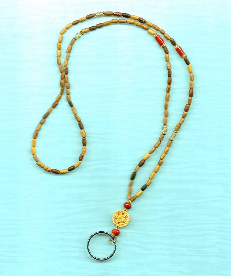 Holz, Rote Keramik Und Geschnitzter Knochen-Schlüsselband von Makalapua