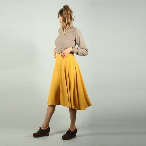ManduTrap Midi - Tellerrock Thara aus Tencel in senfgelb ManduTrap Midi - Tellerrock Thara aus Tencel in senfgelb von ManduTrap