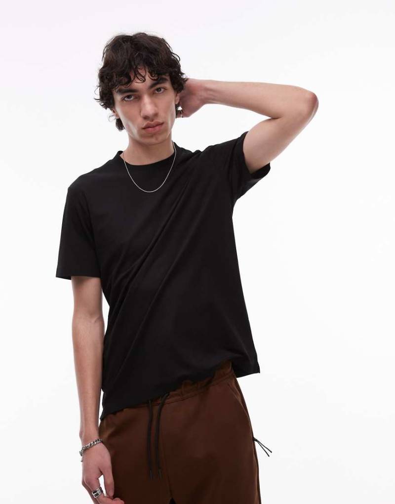 Mango - Atmungsaktives T-Shirt aus Funktionsmaterial in Schwarz von Mango