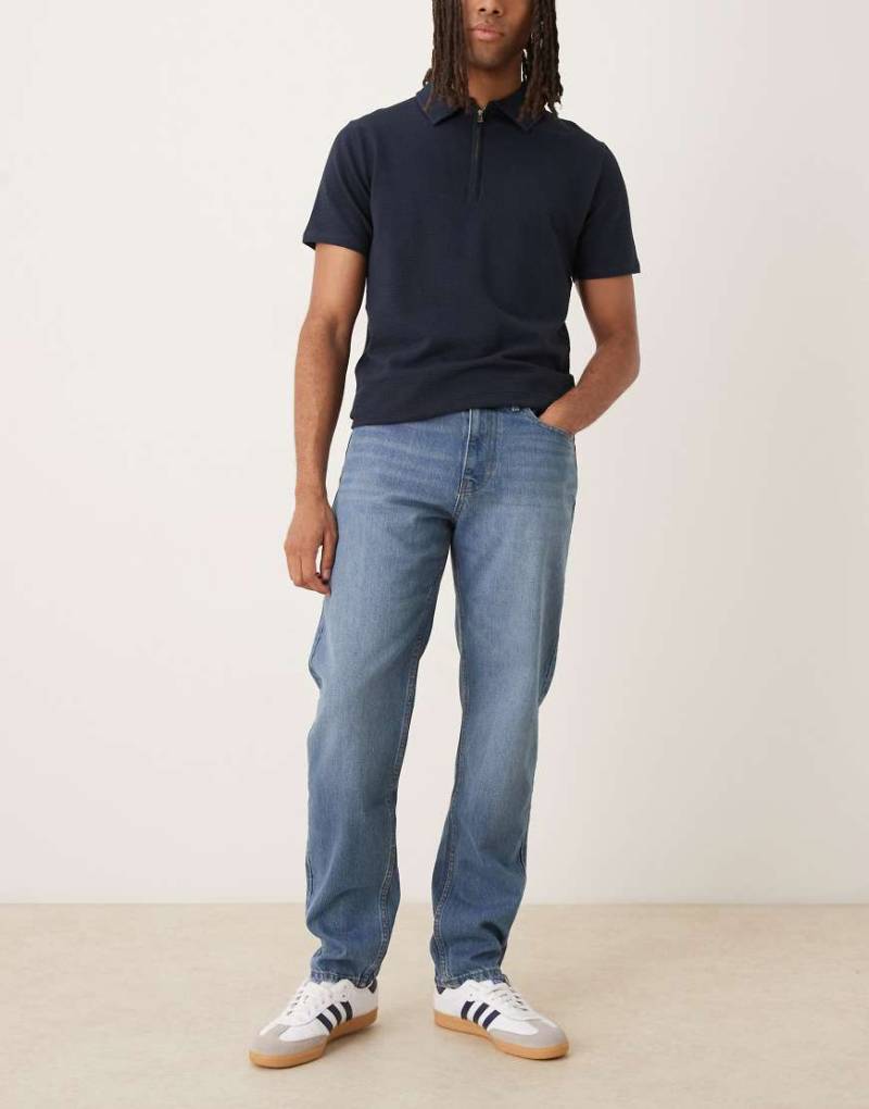 Mango - Bob - Schmal zulaufende Jeans aus Baumwolle in Mittelblau Mango - Bob - Schmal zulaufende Jeans aus Baumwolle in Mittelblau von Mango