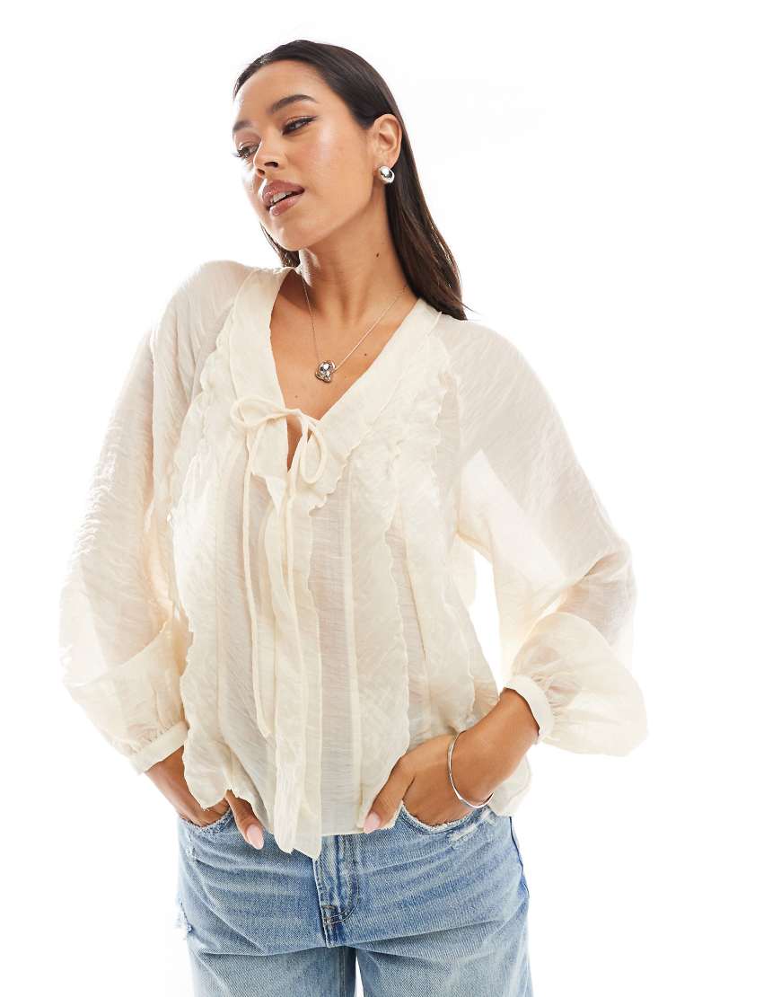Mango - Boho-Bluse in Weiß mit Bindeband vorne Mango - Boho-Bluse in Weiß mit Bindeband vorne von Mango