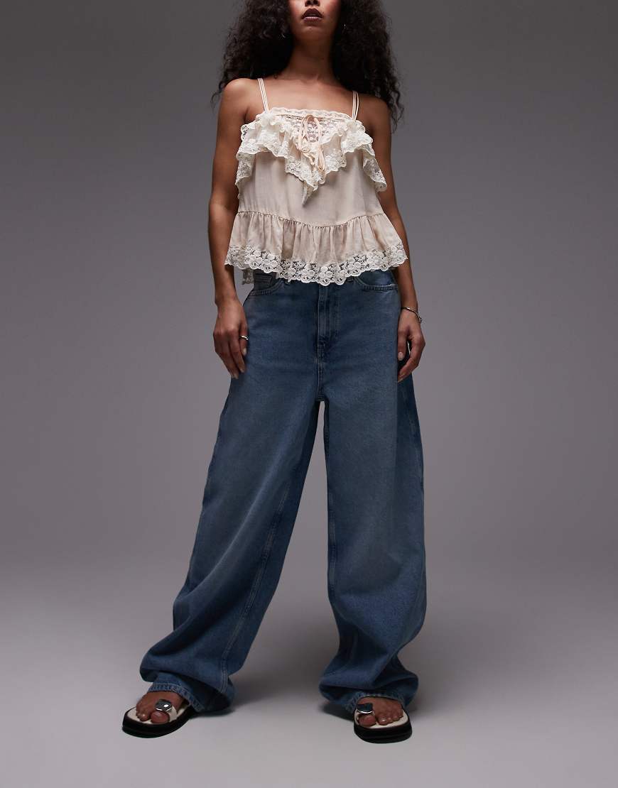 Mango - Camilla - Weite Relaxed-Fit-Jeans in Blau mit verwaschener Vorderseite Mango - Camilla - Weite Relaxed-Fit-Jeans in Blau mit verwaschener Vorderseite von Mango