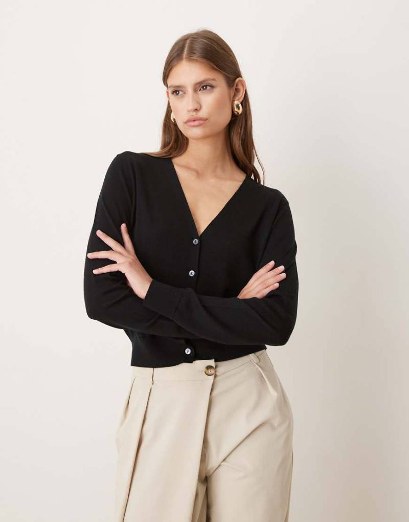 Mango - Capsule - Strukturierte Strickjacke aus 100% Wolle in Schwarz mit V-Ausschnitt von Mango