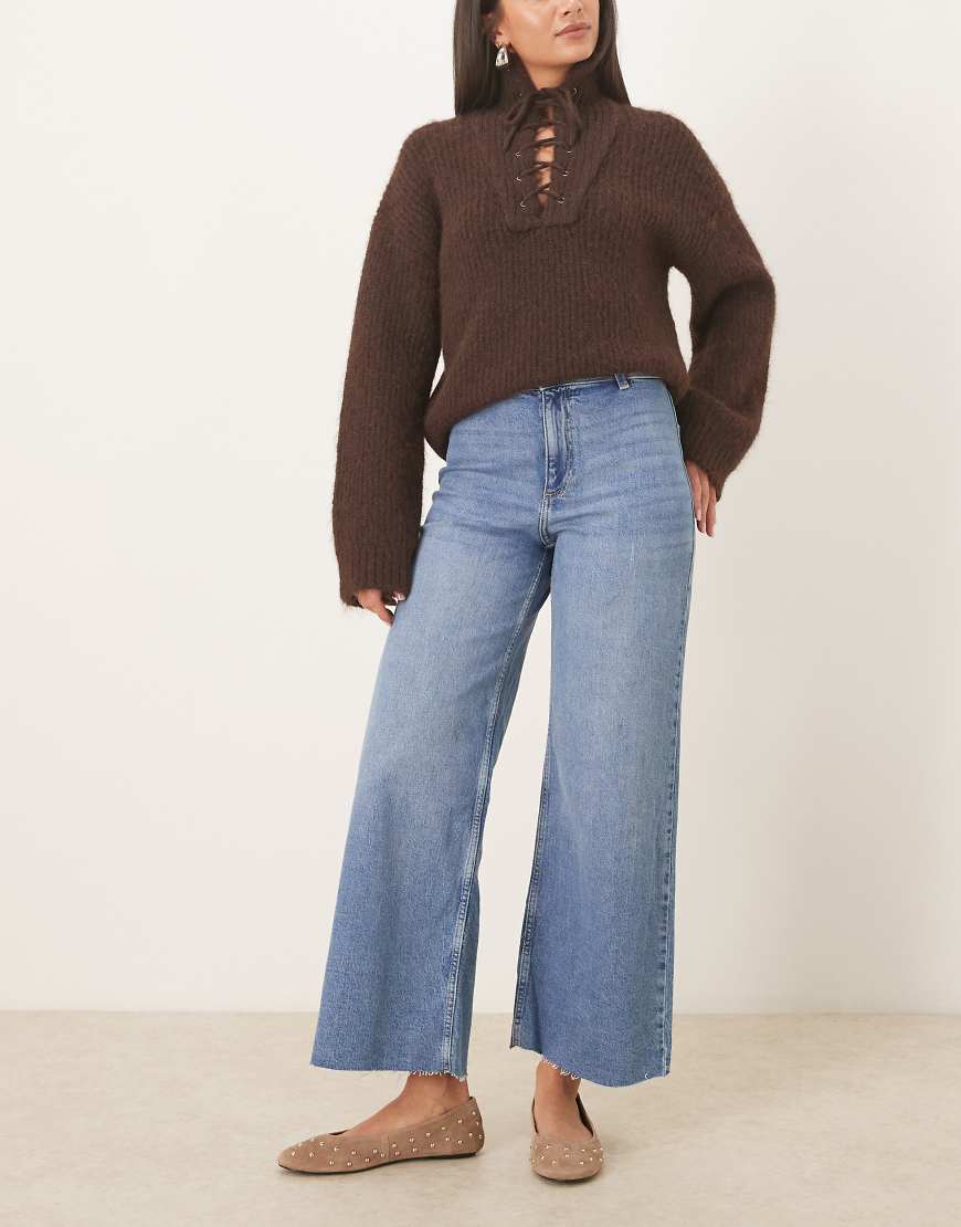 Mango - Catherin - Straight-Leg-Jeans aus Baumwollmix in Mittelblau mit Fransensaum von Mango