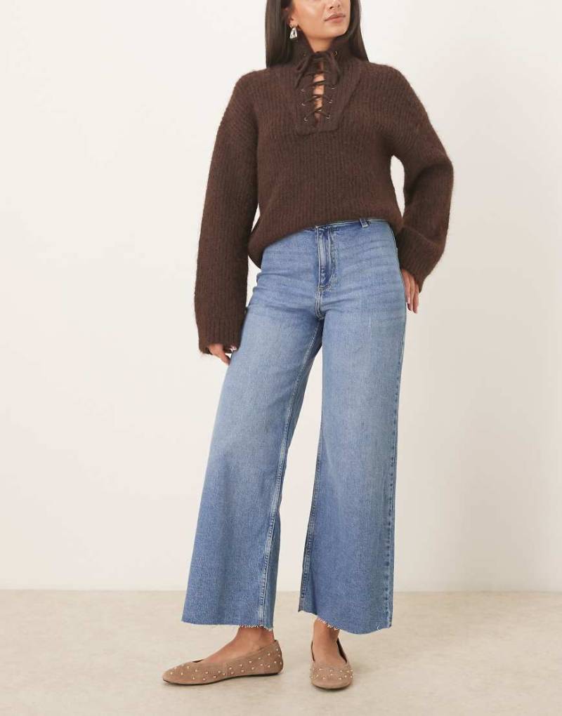 Mango - Catherin - Straight-Leg-Jeans aus Baumwollmix in Mittelblau mit Fransensaum von Mango