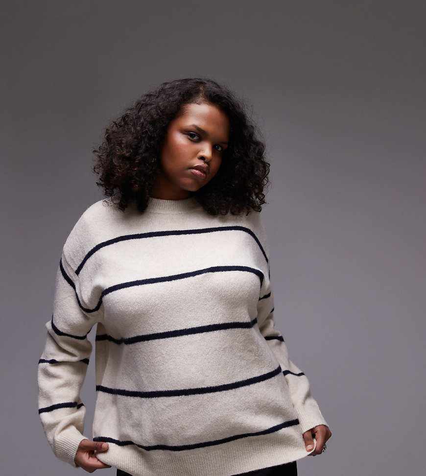 Mango Curve - Hochgeschlossener Pullover in Braun gestreift Mango Curve - Hochgeschlossener Pullover in Braun gestreift von Mango