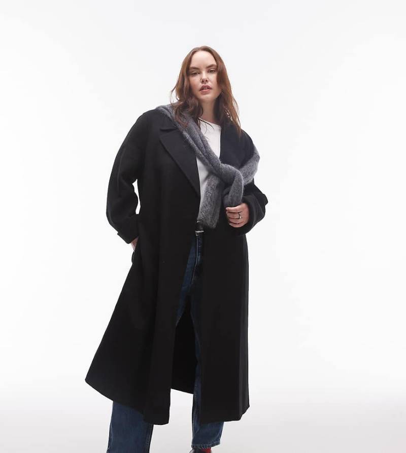 Mango Curve - Wollmantel in Schwarz mit Bindegürtel von Mango