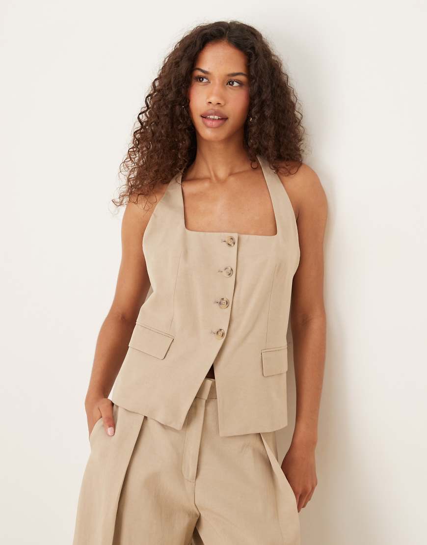 Mango - Elegante Baumwollmix-Weste in Steinbeige mit Neckholder, Kombiteil-Neutral Mango - Elegante Baumwollmix-Weste in Steinbeige mit Neckholder, Kombiteil-Neutral von Mango
