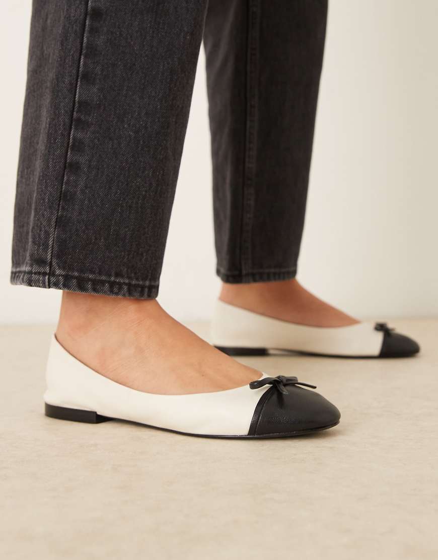 Mango - Flache Ballerinas in Schwarz und Weiß mit Schleifenverzierung von Mango