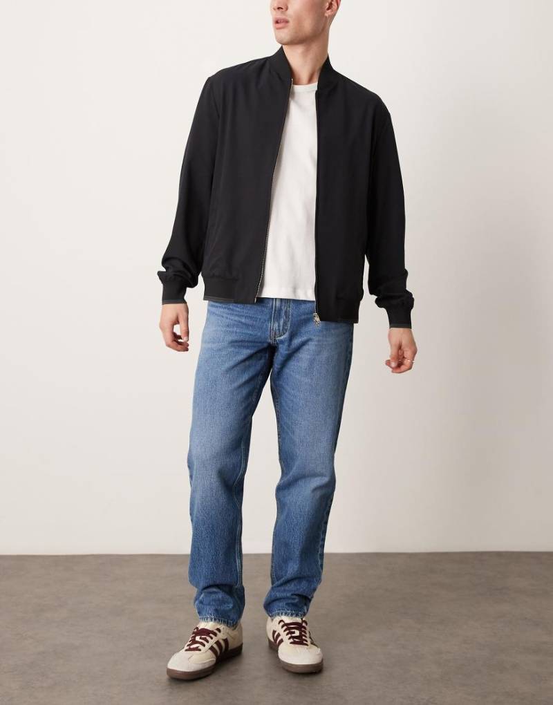 Mango - Gerade geschnittene Denim-Jeans in verwaschenem Mittelblau von Mango