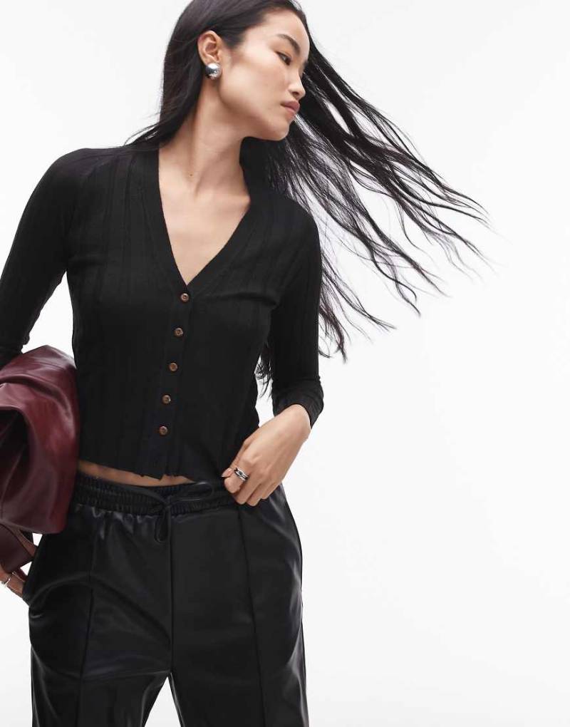 Mango - Gerippte Strickjacke in Schwarz mit durchgehender Knopfleiste von Mango