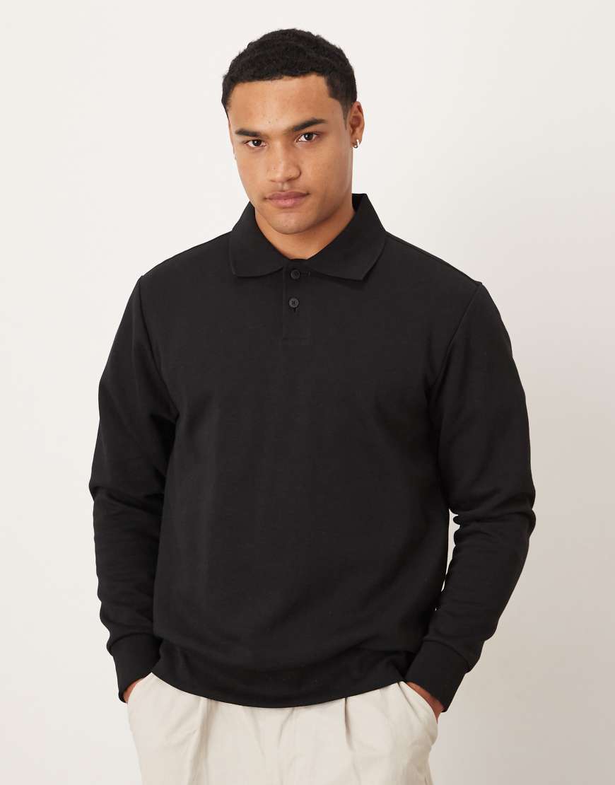 Mango - Gestricktes Polo-Oberteil in Schwarz aus Baumwollmix mit Knopfleiste Mango - Gestricktes Polo-Oberteil in Schwarz aus Baumwollmix mit Knopfleiste von Mango