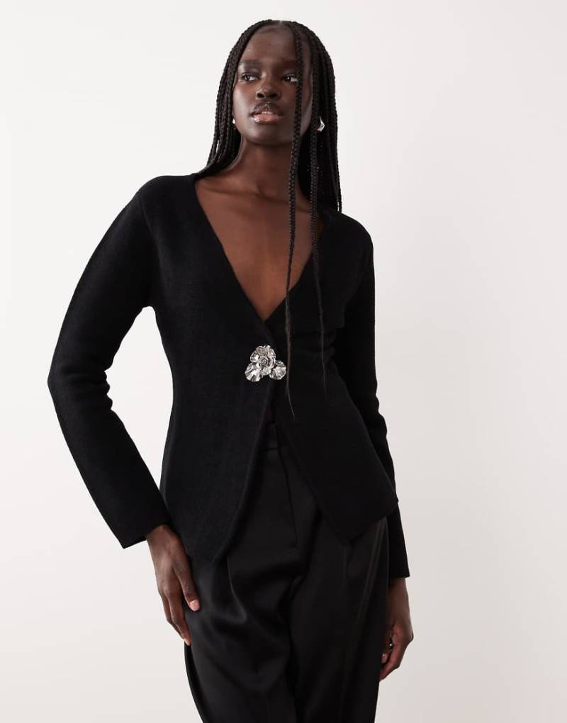 Mango - Jacke aus kompaktem Strick in Schwarz mit markantem Verschluss von Mango