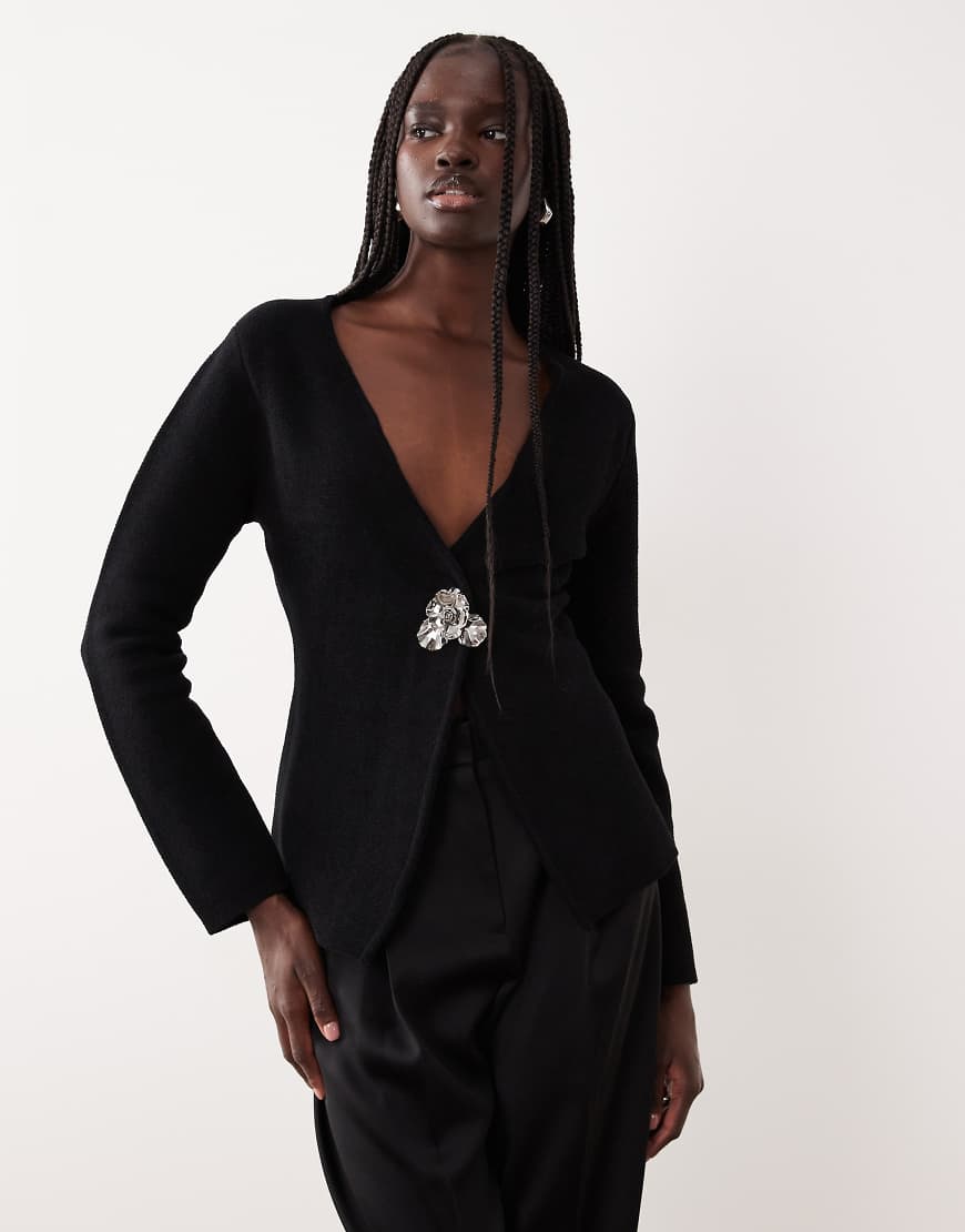 Mango - Jacke aus kompaktem Strick in Schwarz mit markantem Verschluss von Mango