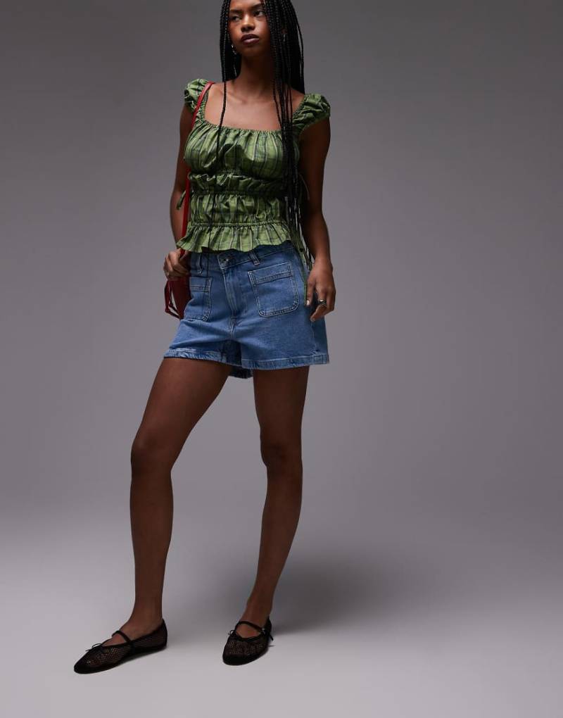 Mango - Jeans-Shorts in Hellblau mit Vordertaschen und schmalem Schnitt von Mango