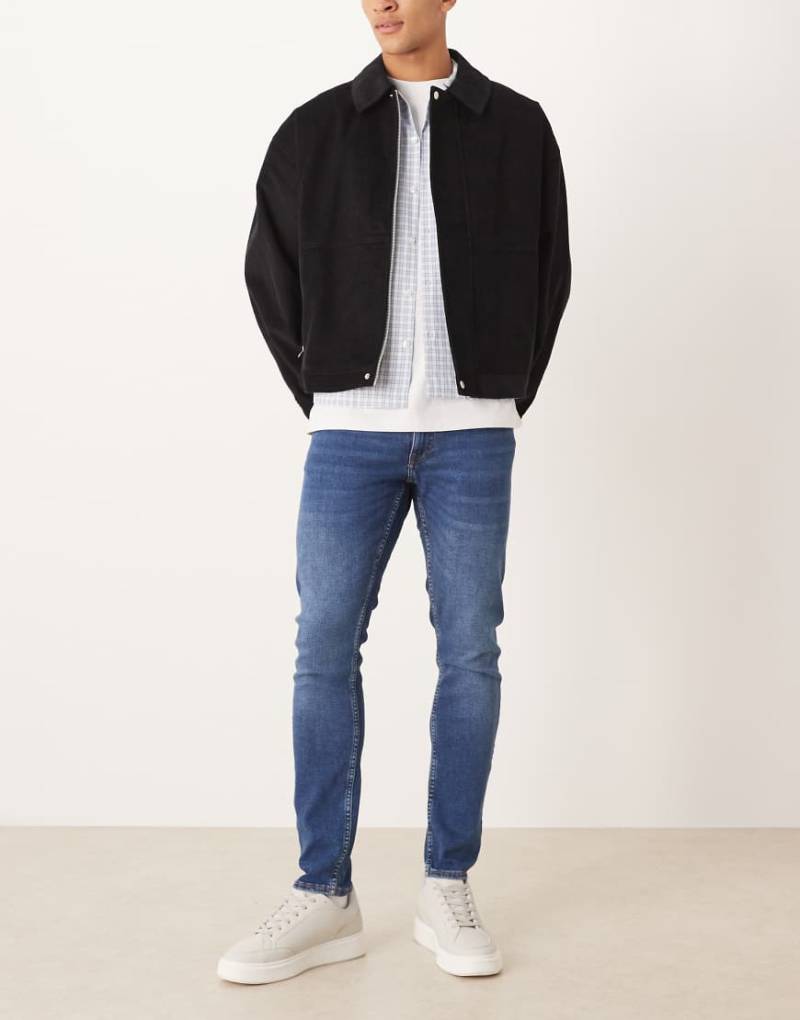 Mango - Jeans aus Baumwolle in Dunkelblau mit schmalem Schnitt von Mango