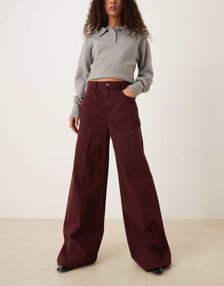 Mango - Jeans aus Baumwolle in Dunkelrot mit weitem Bein und Bundfalten von Mango
