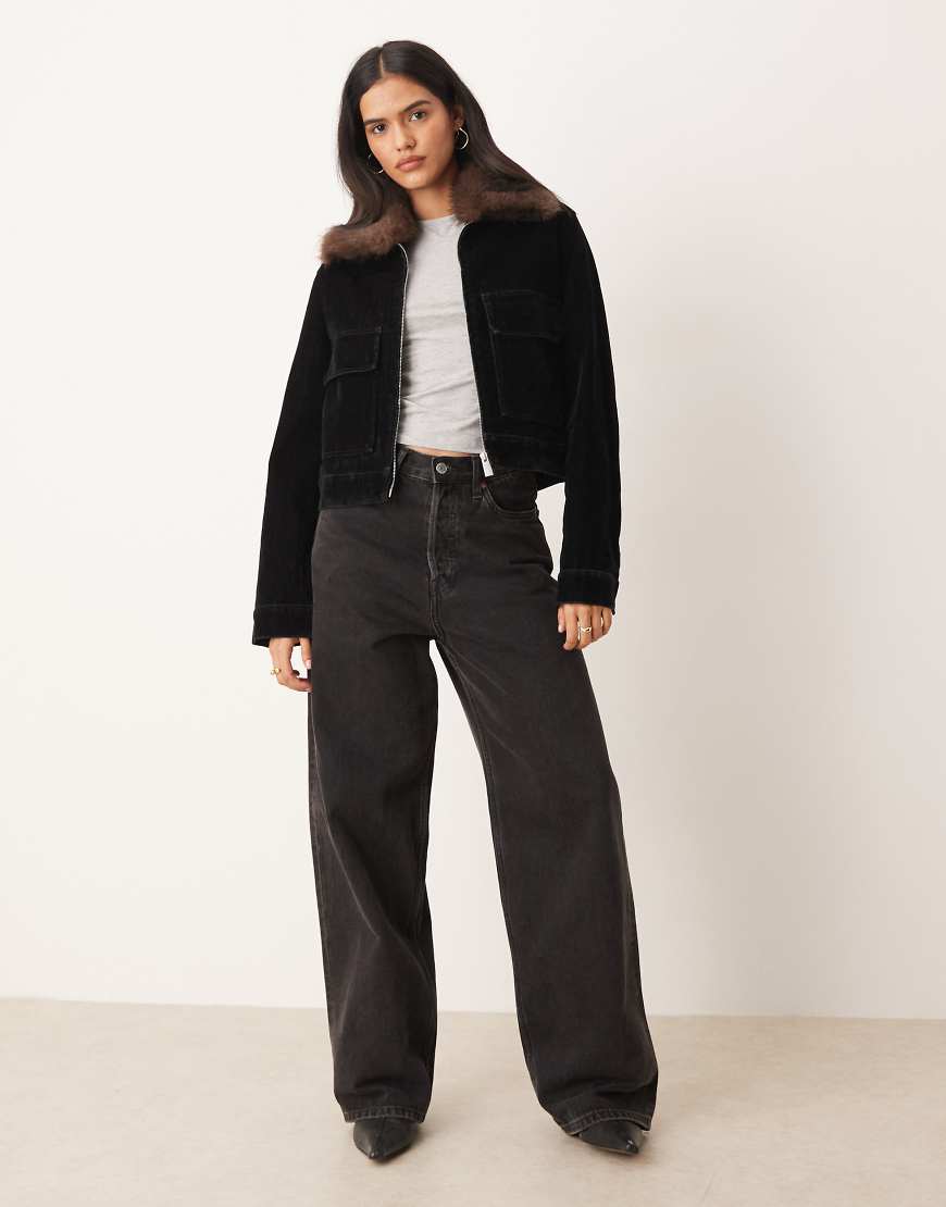 Mango - Jeansjacke in Schwarz mit Kragen aus Kunstpelz von Mango