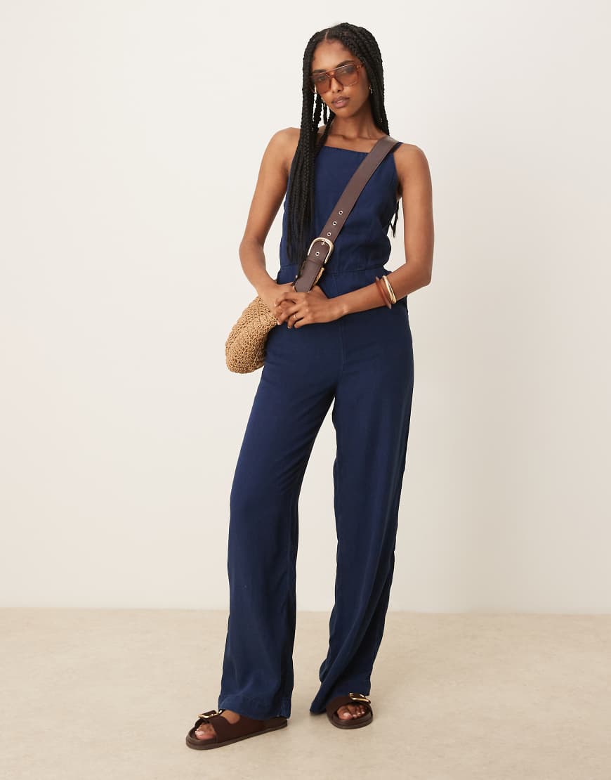 Mango - Jumpsuit in indigoblauer Jeans-Optik mit geradem Bein Mango - Jumpsuit in indigoblauer Jeans-Optik mit geradem Bein von Mango
