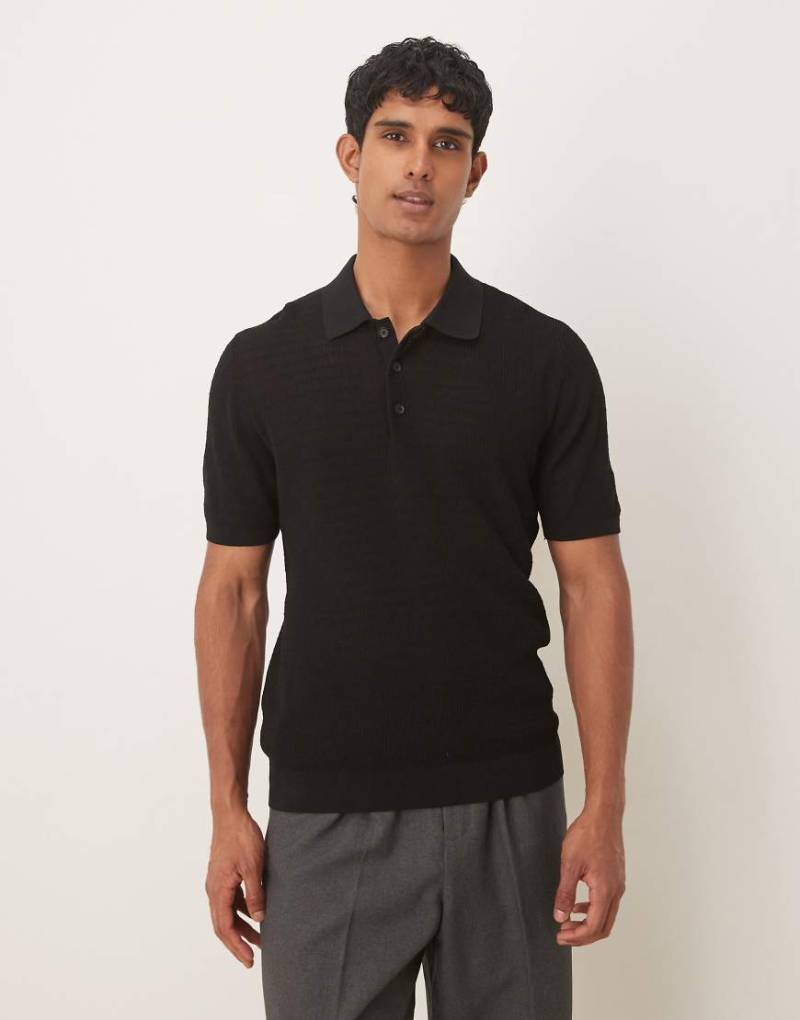 Mango - Kurzärmliges Baumwollmix-Polohemd in Schwarz mit Reverskragen Mango - Kurzärmliges Baumwollmix-Polohemd in Schwarz mit Reverskragen von Mango