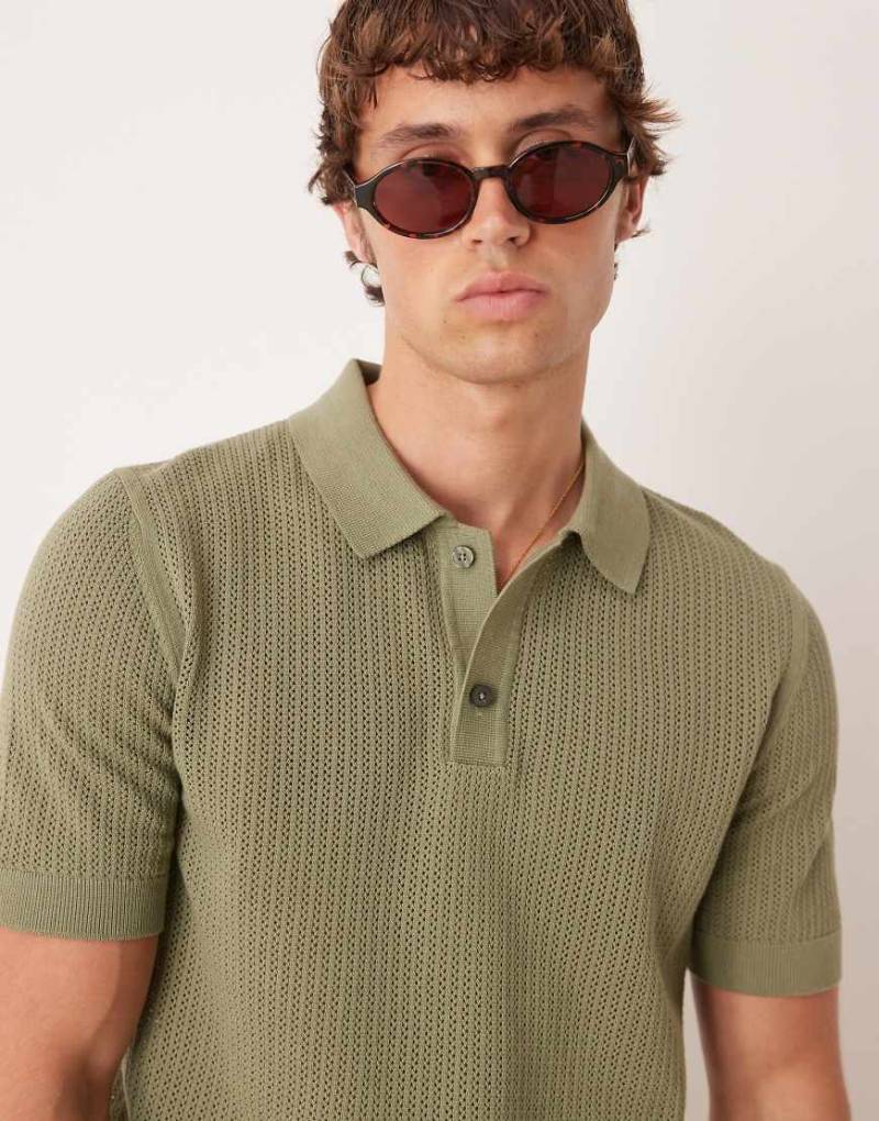 Mango - Kurzärmliges Polohemd in Hellgrün mit durchbrochenem Strickmuster von Mango