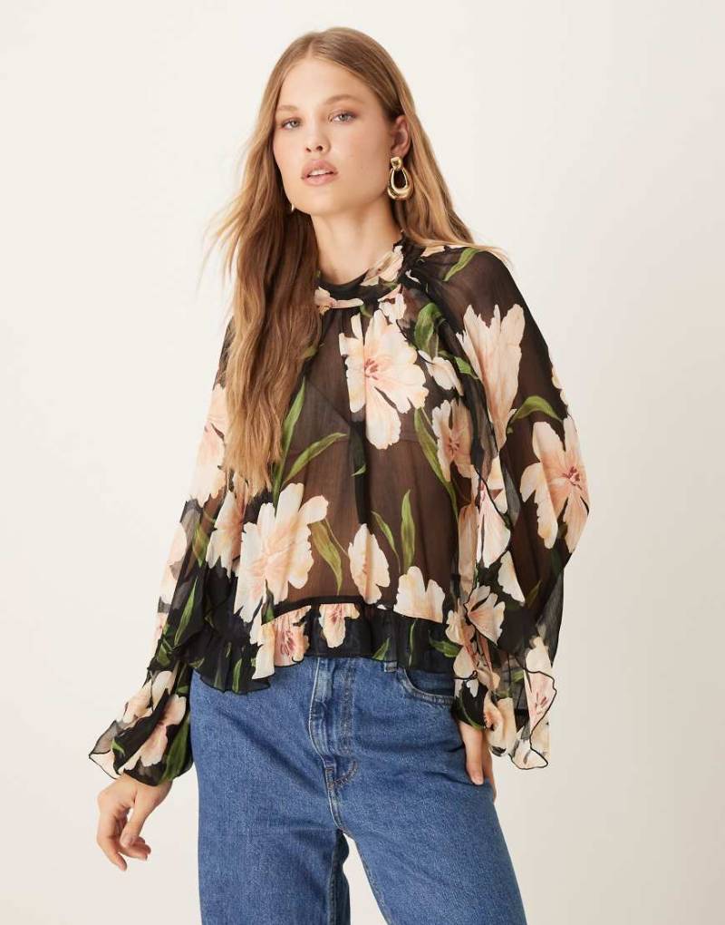 Mango - Langärmlige, transparente Bluse mit Rundhalsausschnitt und Blumenmuster auf dunklem Untergrund-Schwarz von Mango