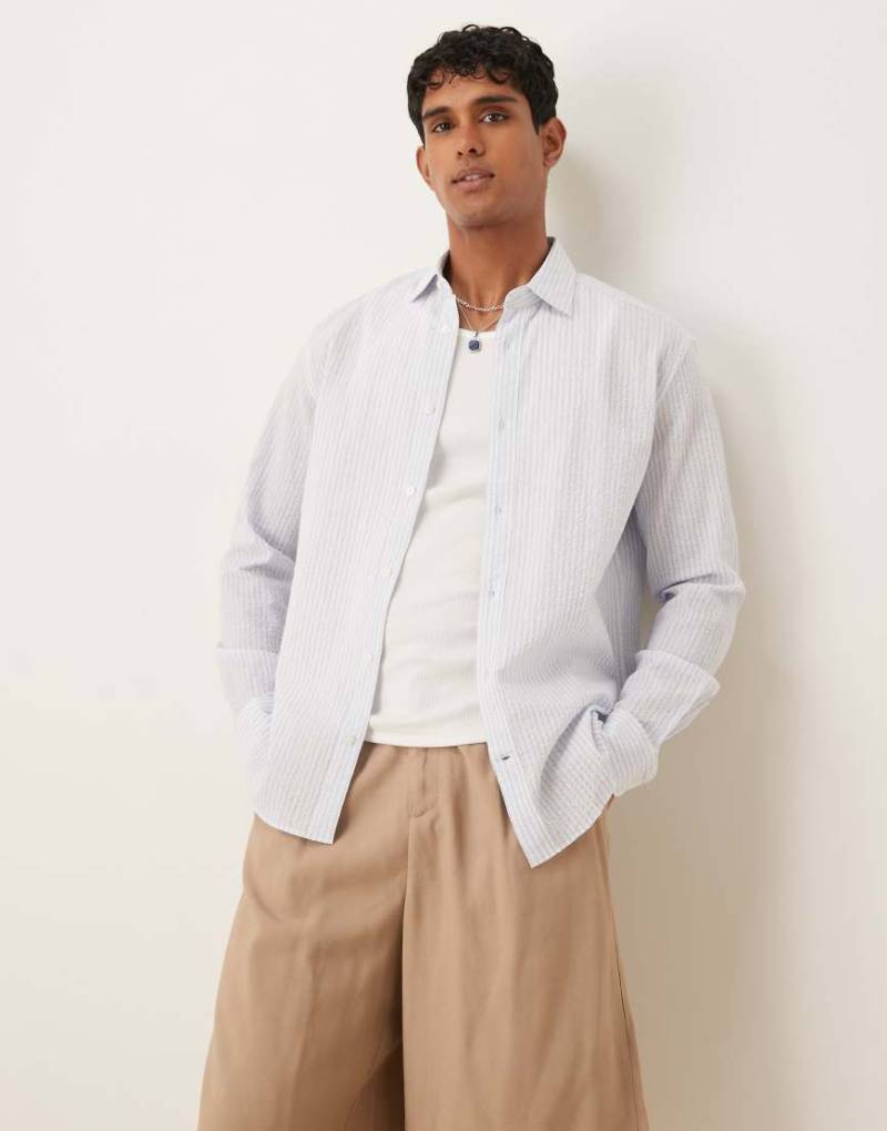 Mango - Langärmliges Hemd aus Baumwoll-Seersucker in gestreiftem Hellblau von Mango