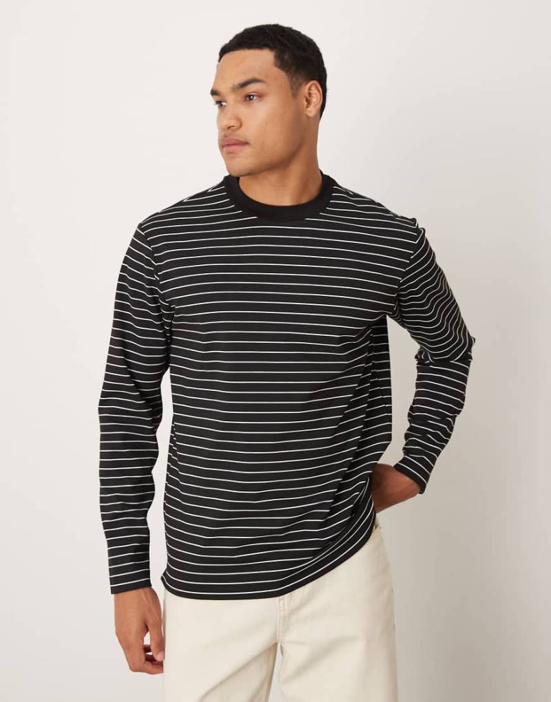 Mango - Langärmliges T-Shirt in gestreiftem Schwarz von Mango